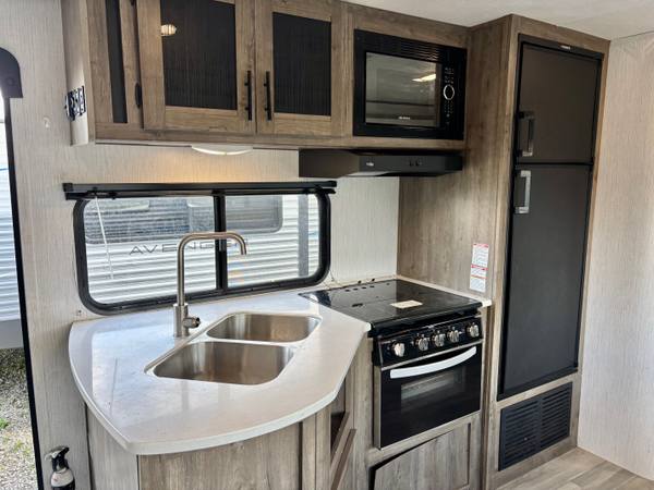 2021 Heartland Pioneer QB300 Private Quad Bunkroom travel trailer for sale at Triple C Camper Consignment in Kentuckiana — photo 10 of 12