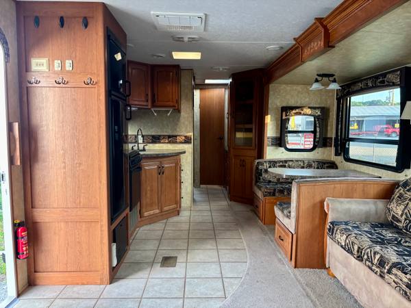 2011 Forest River Sierra 303BH Private Bunkroom — photo 7